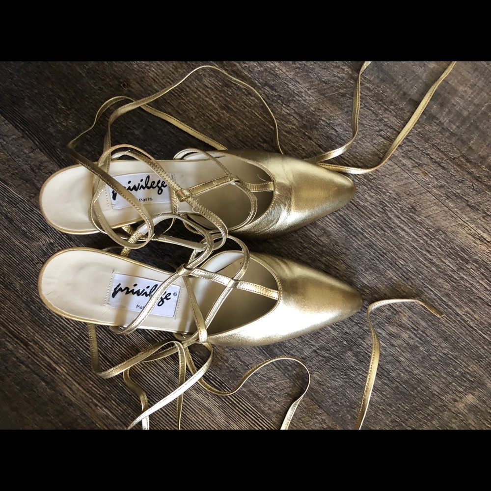 Gold leather slip on closed toe heels
